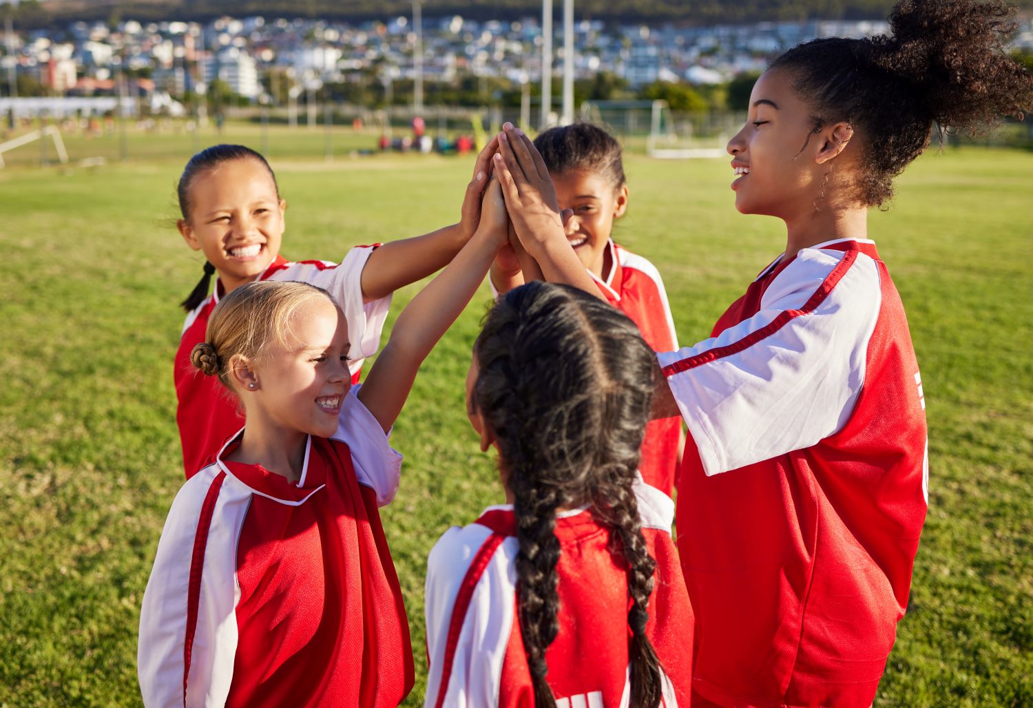 children-football-team-and-high-five-for-sports-g-2023-11-27-04-55-20-utc